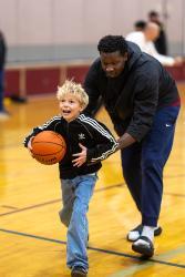 Fernan STEM Academy fifth-grader Dauson Simmons participates in a drill with NIC Men’s basketball player Aly Toure, right, during an NIC basketball skills showcase on Wednesday, Oct. 22 at Fernan STEM Academy in Coeur d’Alene. NIC Athletics