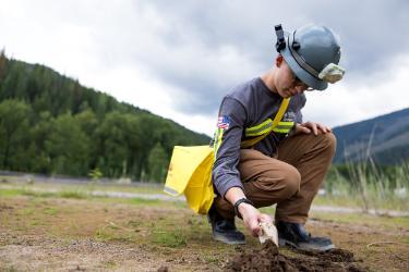 Mining Student doing soil samples in the field