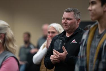 NIC Dual Credit Advisor Aleasha Lomas celebrates with others during a special board meeting on Monday at the Lake Coeur d’Alene Room of the Edminster Student Union Building on NIC’s Coeur d’Alene campus.